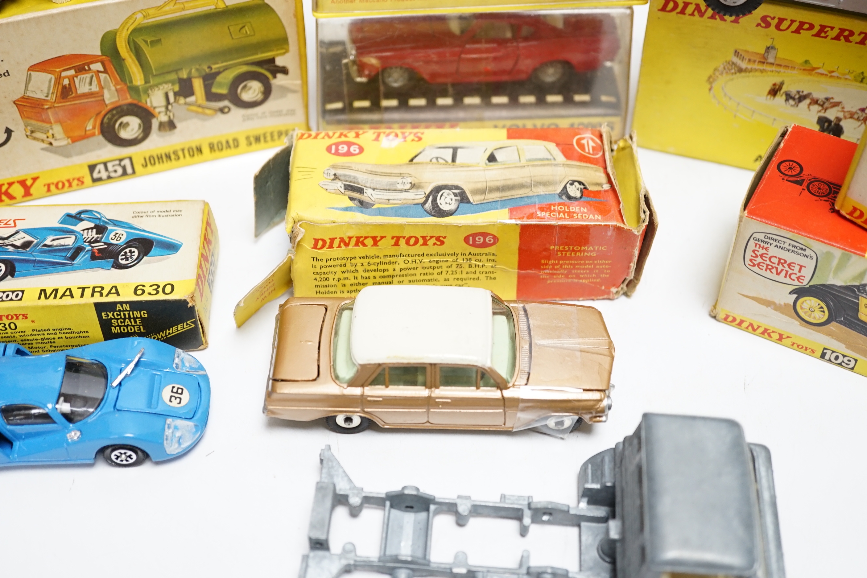Eight boxed Dinky Toys including two (109) Gabriel Model T Fords, (987) ABC TV Mobile Control Room, (200) Matra 630, (116) Volvo 1800S, (216) Ferrari Dino, (196) Holden Special Sedan, (451) Johnston Road Sweeper, plus an
